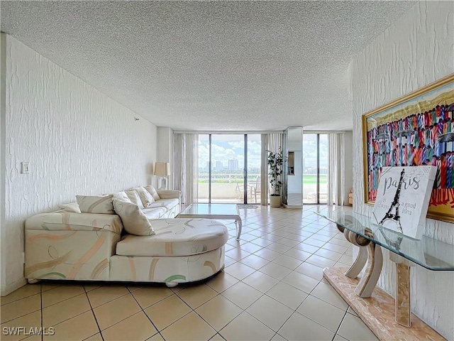 20225 NE 34th Ct, Miami, FL 33180 - living area featuring a textured ceiling, light tile patterned floors, and floor to ceiling windows