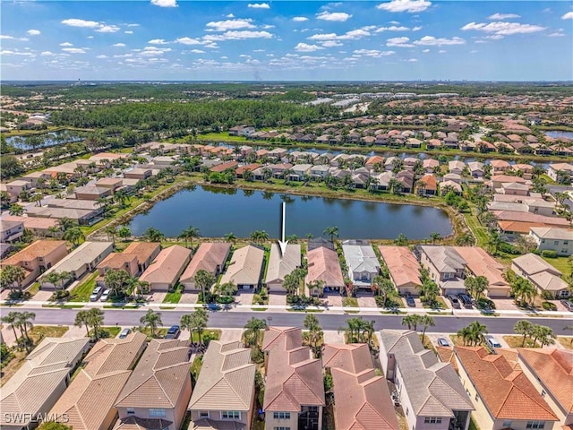 10486 Winged Elm Ln, Fort Myers, FL 33913 - aerial perspective of suburban area featuring a large body of water