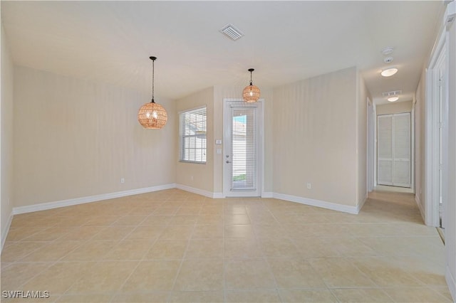 10486 Winged Elm Ln, Fort Myers, FL 33913 - unfurnished room with light tile patterned floors and a chandelier