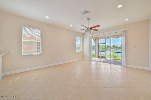 10486 Winged Elm Ln, Fort Myers, FL 33913 - unfurnished room featuring light tile patterned floors, ceiling fan, and recessed lighting