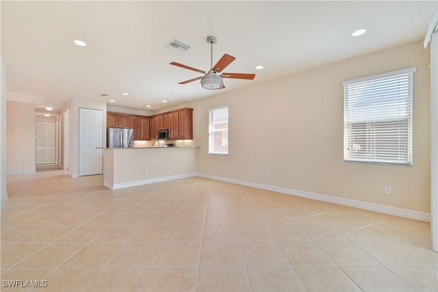 10486 Winged Elm Ln, Fort Myers, FL 33913 - unfurnished living room with a ceiling fan, light tile patterned floors, and recessed lighting