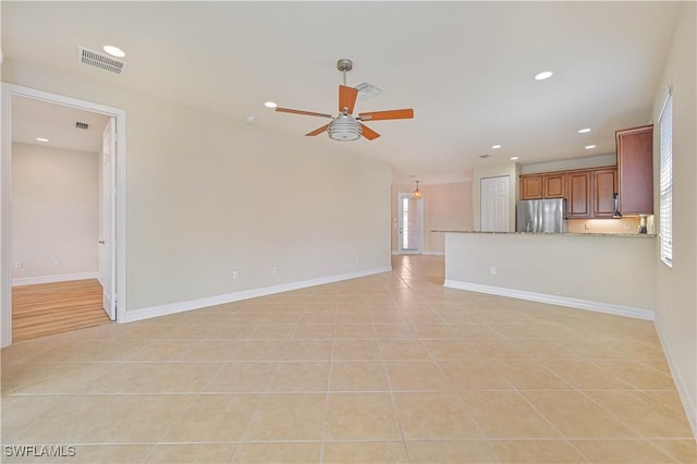 10486 Winged Elm Ln, Fort Myers, FL 33913 - unfurnished living room featuring ceiling fan, recessed lighting, and light tile patterned floors