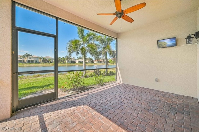 10486 Winged Elm Ln, Fort Myers, FL 33913 - unfurnished sunroom with a water view and a ceiling fan