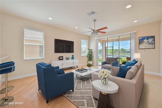 10486 Winged Elm Ln, Fort Myers, FL 33913 - living room with recessed lighting, a ceiling fan, and light wood-type flooring