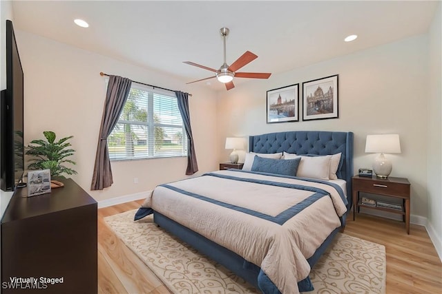 10486 Winged Elm Ln, Fort Myers, FL 33913 - bedroom with light wood-type flooring, recessed lighting, and ceiling fan