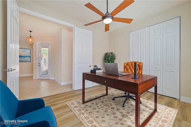 10486 Winged Elm Ln, Fort Myers, FL 33913 - office area featuring ceiling fan and light wood-type flooring