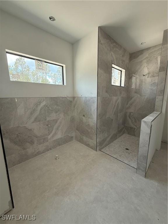 2481 24th Ave NE, Naples, FL 34120 - full bath with healthy amount of natural light and walk in shower