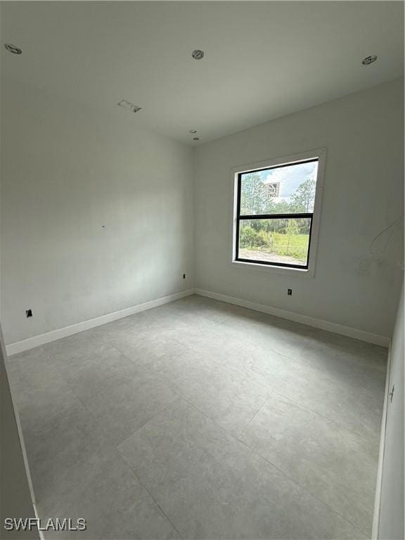 2481 24th Ave NE, Naples, FL 34120 - empty room featuring baseboards