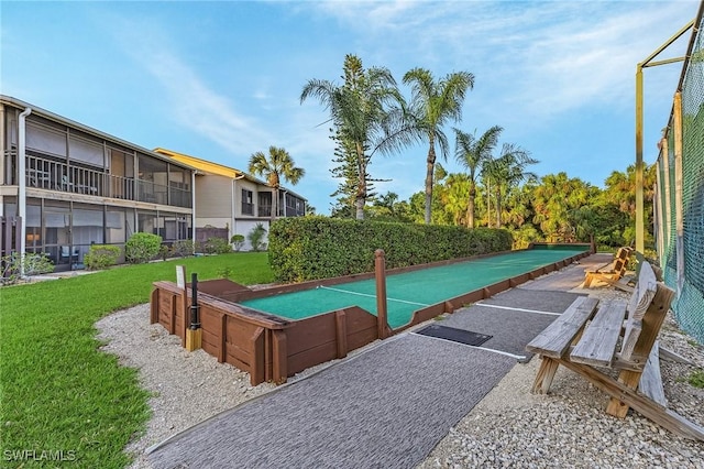 15030 Arbor Lakes Dr W Unit 201, North Fort Myers, FL 33917 - surrounding community featuring a lawn