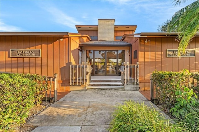 15030 Arbor Lakes Dr W Unit 201, North Fort Myers, FL 33917 - property entrance with board and batten siding