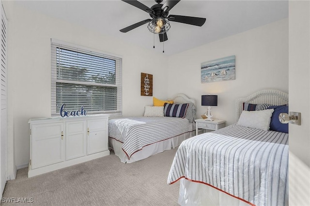15030 Arbor Lakes Dr W Unit 201, North Fort Myers, FL 33917 - bedroom featuring a ceiling fan and light colored carpet