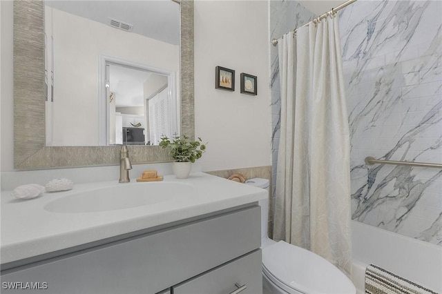 15030 Arbor Lakes Dr W Unit 201, North Fort Myers, FL 33917 - bathroom featuring visible vents, toilet, shower / bathtub combination with curtain, vanity, and radiator heating unit
