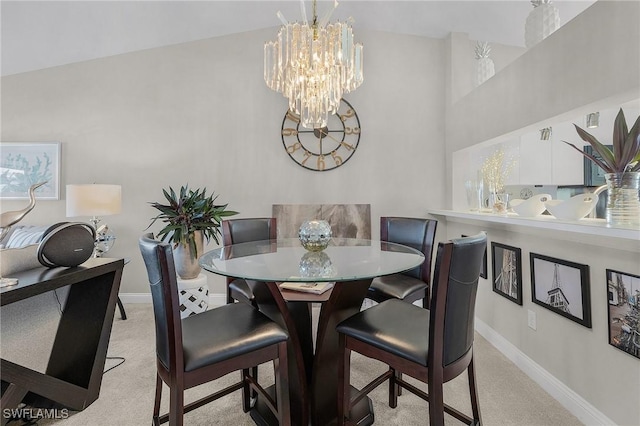 15030 Arbor Lakes Dr W Unit 201, North Fort Myers, FL 33917 - dining area with a notable chandelier, light colored carpet, and baseboards