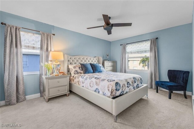 15030 Arbor Lakes Dr W Unit 201, North Fort Myers, FL 33917 - bedroom featuring baseboards, a ceiling fan, and carpet floors