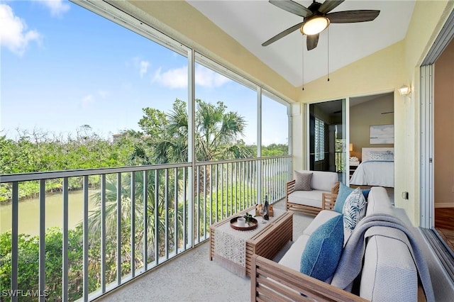 sunroom / solarium with outdoor lounge area and a ceiling fan