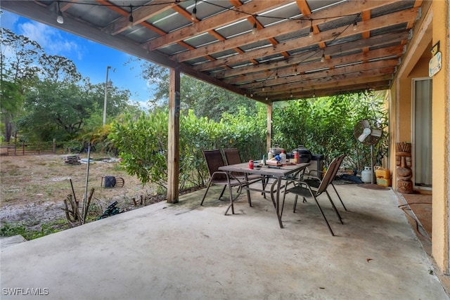 view of patio with outdoor dining area