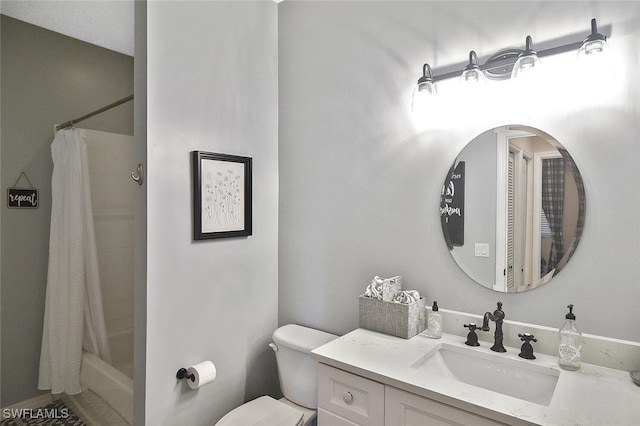 bathroom with shower / bathtub combination with curtain, vanity, and toilet