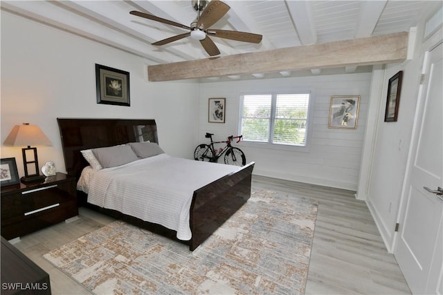 2061 Santa Barbara Blvd, Naples, FL 34116 - bedroom featuring beam ceiling, light wood-style flooring, and a ceiling fan