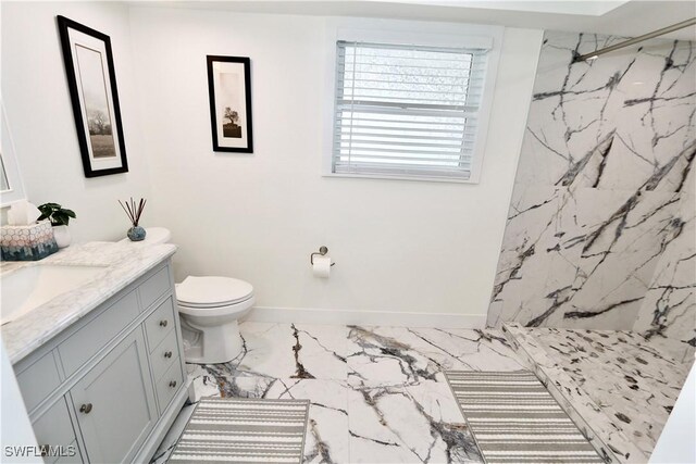 2061 Santa Barbara Blvd, Naples, FL 34116 - full bath with marble finish floors, a marble finish shower, toilet, and vanity