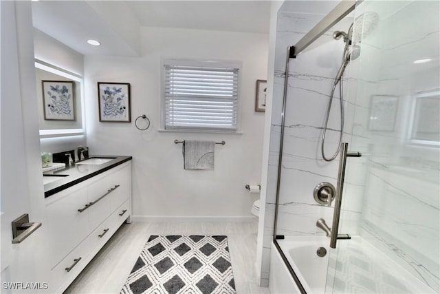 2061 Santa Barbara Blvd, Naples, FL 34116 - bathroom with vanity, baseboards, and toilet