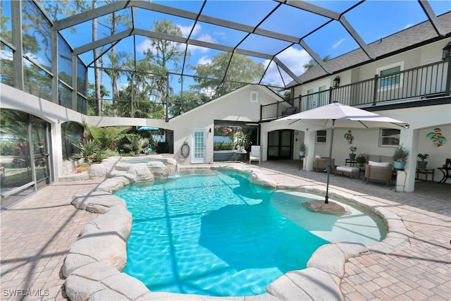 2061 Santa Barbara Blvd, Naples, FL 34116 - view of swimming pool featuring a patio, glass enclosure, and a pool with connected hot tub