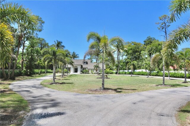 2061 Santa Barbara Blvd, Naples, FL 34116 - view of front of property featuring a front lawn and driveway