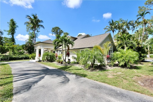 2061 Santa Barbara Blvd, Naples, FL 34116 - view of front of property featuring driveway and stucco siding