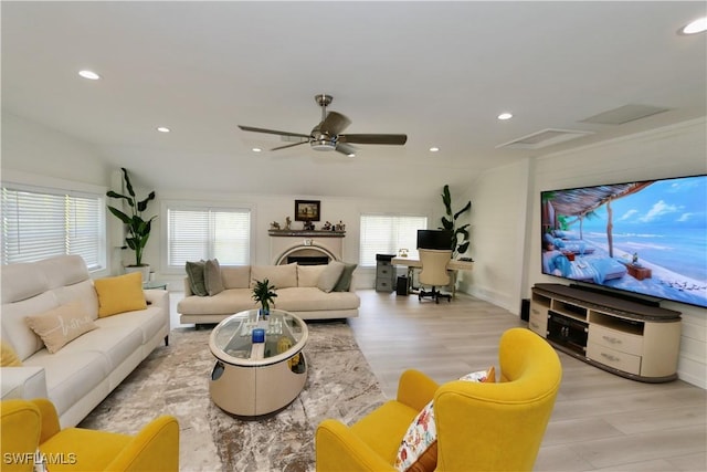2061 Santa Barbara Blvd, Naples, FL 34116 - living room with vaulted ceiling, healthy amount of natural light, ceiling fan, recessed lighting, and light wood-style flooring