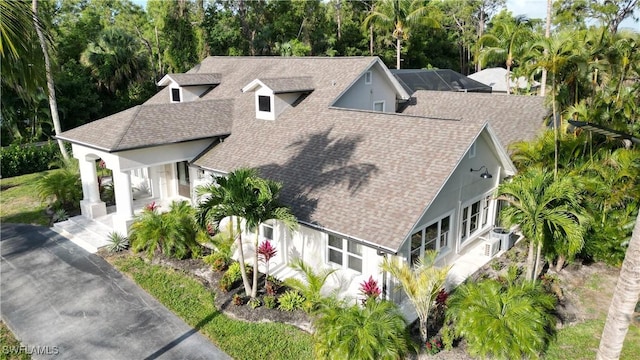 2061 Santa Barbara Blvd, Naples, FL 34116 - view of subject property featuring a tree filled landscape