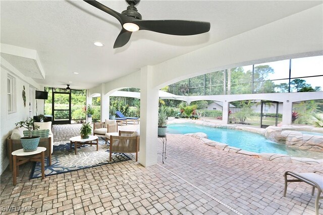 2061 Santa Barbara Blvd, Naples, FL 34116 - swimming pool with ceiling fan, a patio, and an outdoor living space