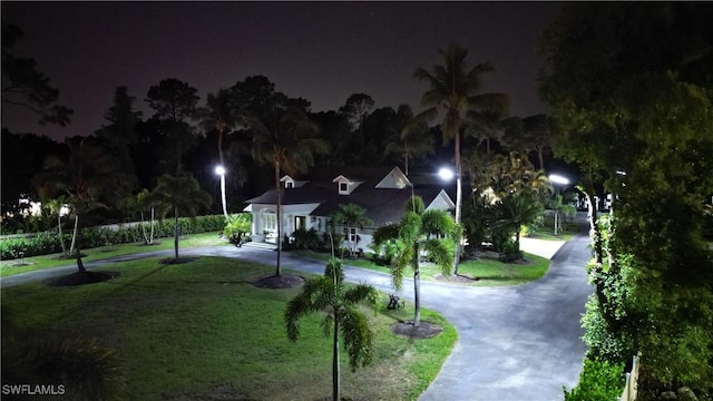 2061 Santa Barbara Blvd, Naples, FL 34116 - surrounding community featuring a lawn