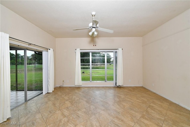 unfurnished room with ceiling fan