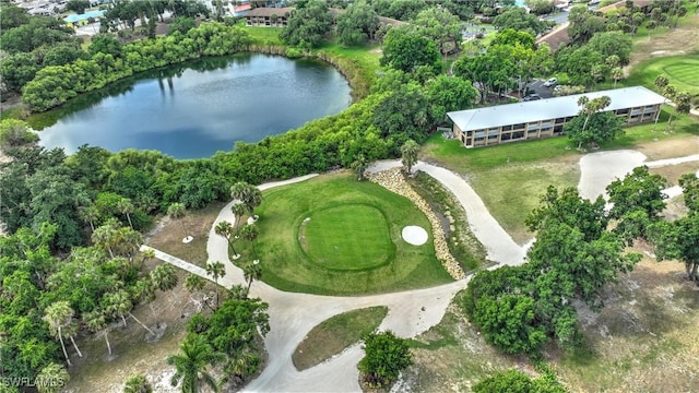 bird's eye view featuring view of golf course and a water view