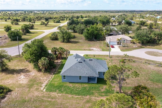 8 Cleat Ct, Placida, FL 33946 - view from above of property with a tree filled landscape