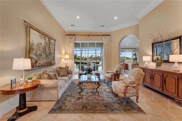 1716 Venezia Way, Naples, FL 34105 - living area with arched walkways, crown molding, light tile patterned flooring, and recessed lighting