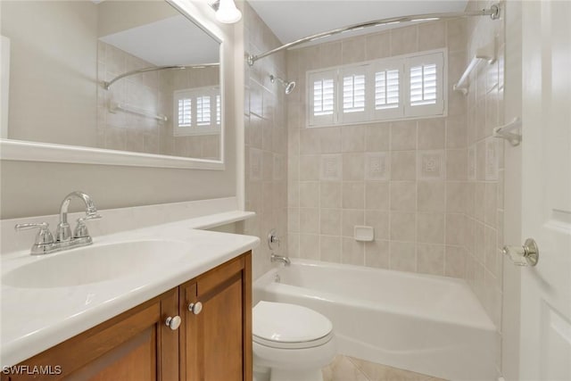14070 Tivoli Ter, Bonita Springs, FL 34135 - bathroom with toilet, tub / shower combination, tile patterned flooring, and vanity