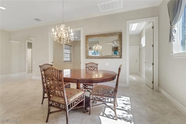 14070 Tivoli Ter, Bonita Springs, FL 34135 - dining area with a chandelier, visible vents, a healthy amount of sunlight, and light tile patterned floors