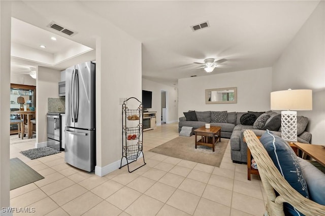 8336 Charter Club Cir Unit 5, Fort Myers, FL 33919 - living area with visible vents, baseboards, ceiling fan, and light tile patterned flooring
