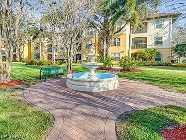 view of community with a lawn