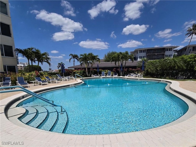 pool with a patio
