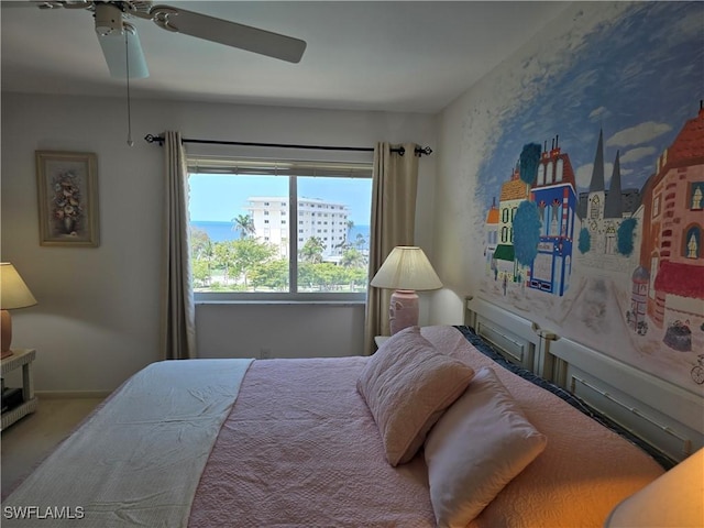 carpeted bedroom with a ceiling fan