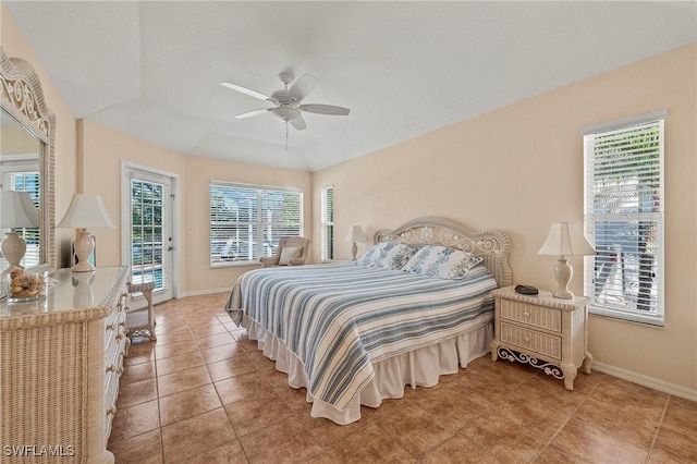 bedroom with light tile patterned flooring, ceiling fan, access to outside, and baseboards