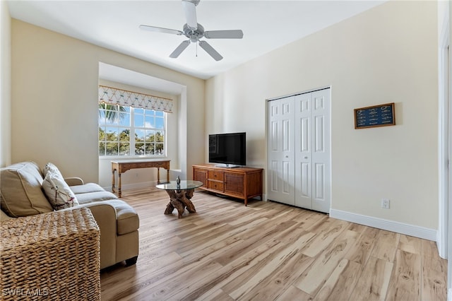1749 Gulfstar Dr S Unit 404, Naples, FL 34112 - living area featuring ceiling fan, light wood-style floors, and baseboards