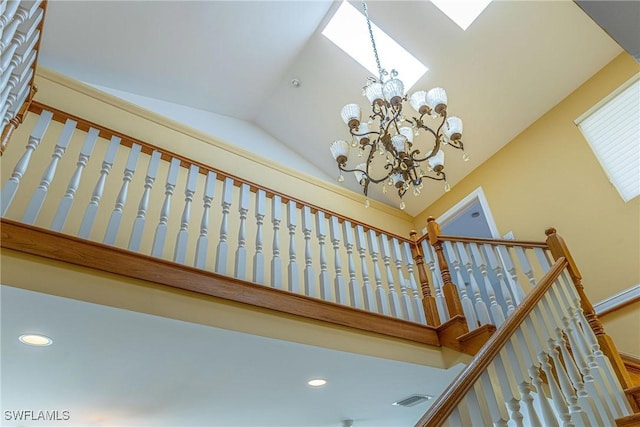 419 Pine Ave, Naples, FL 34108 - staircase featuring high vaulted ceiling, recessed lighting, visible vents, and an inviting chandelier