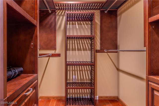 419 Pine Ave, Naples, FL 34108 - spacious closet featuring wood finished floors