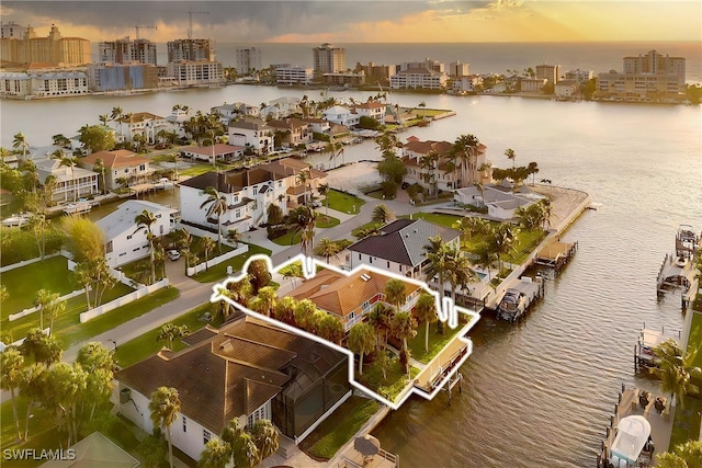 419 Pine Ave, Naples, FL 34108 - aerial view at dusk featuring a water view and a city view
