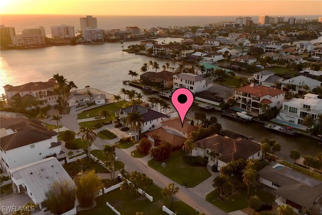 419 Pine Ave, Naples, FL 34108 - birds eye view of property featuring a water view, a residential view, and a view of city