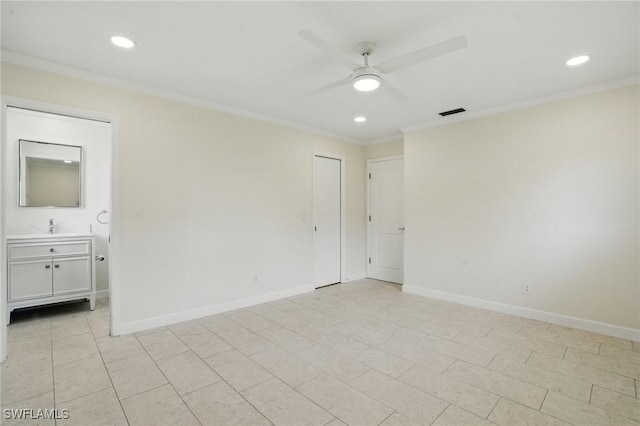 2203 SE Santa Barbara Pl, Cape Coral, FL 33990 - spare room with crown molding, ceiling fan, visible vents, recessed lighting, and baseboards