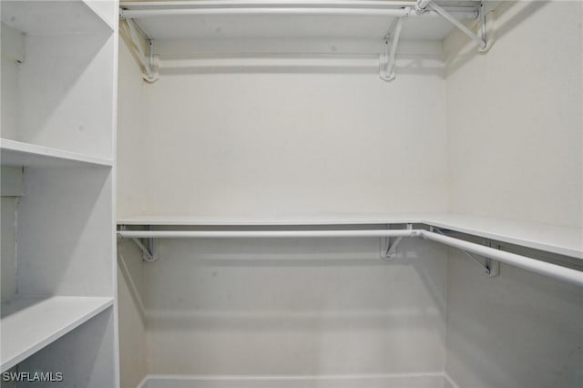 2203 SE Santa Barbara Pl, Cape Coral, FL 33990 - view of walk in closet