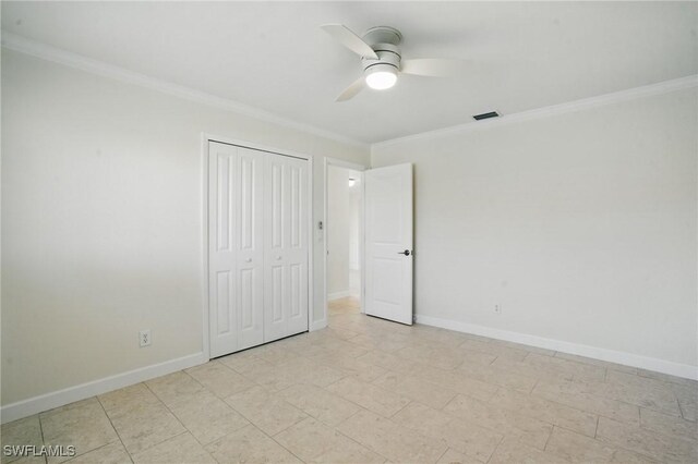 2203 SE Santa Barbara Pl, Cape Coral, FL 33990 - unfurnished bedroom with a closet, baseboards, crown molding, visible vents, and ceiling fan